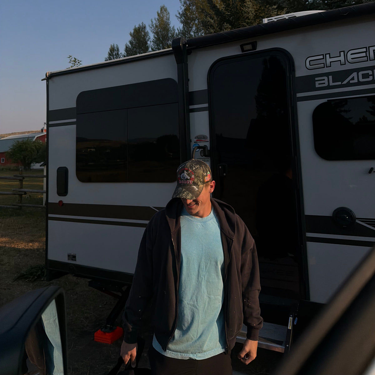 Bull River cap worn beside a truck
