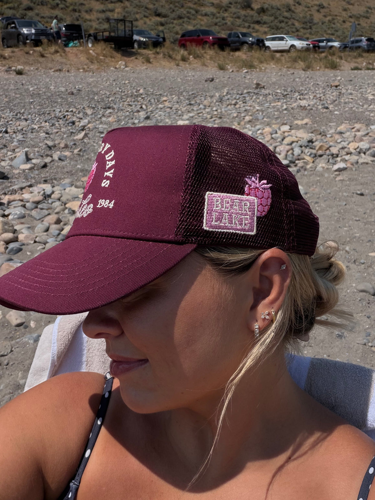 Close portrait of a Bull River Raspberry Days rodeo cap being worn