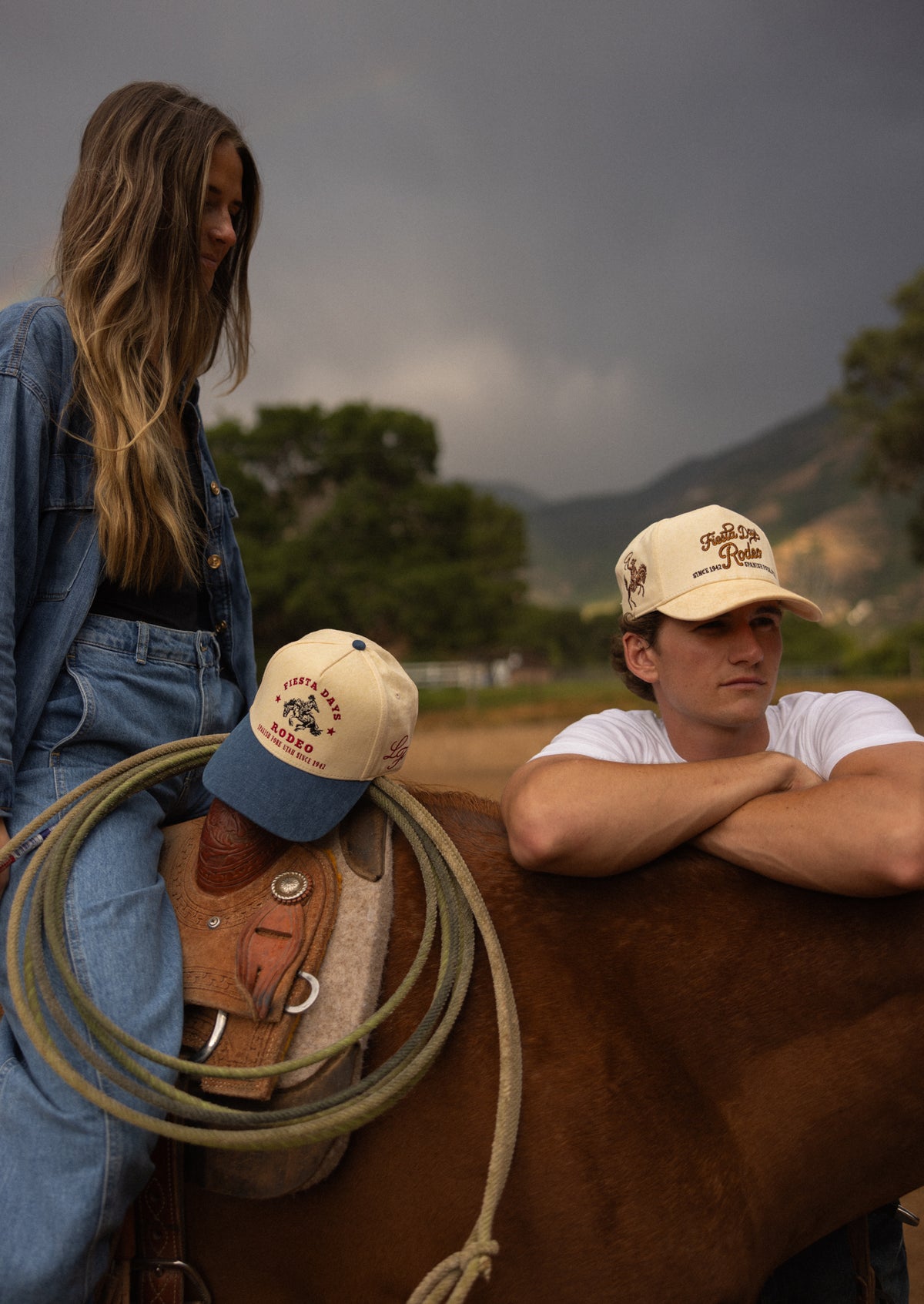 Two riders on horseback in Bull River caps at golden hour