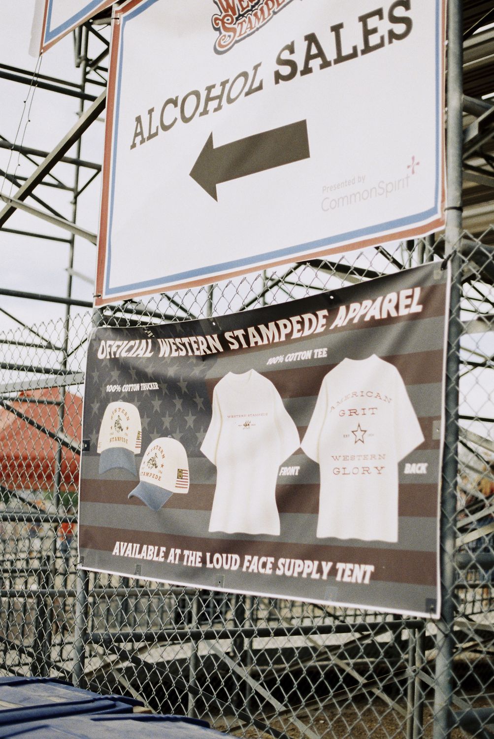 Official Western Stampede Apparel banner at the arena directing fans to the Bull River Supply tent