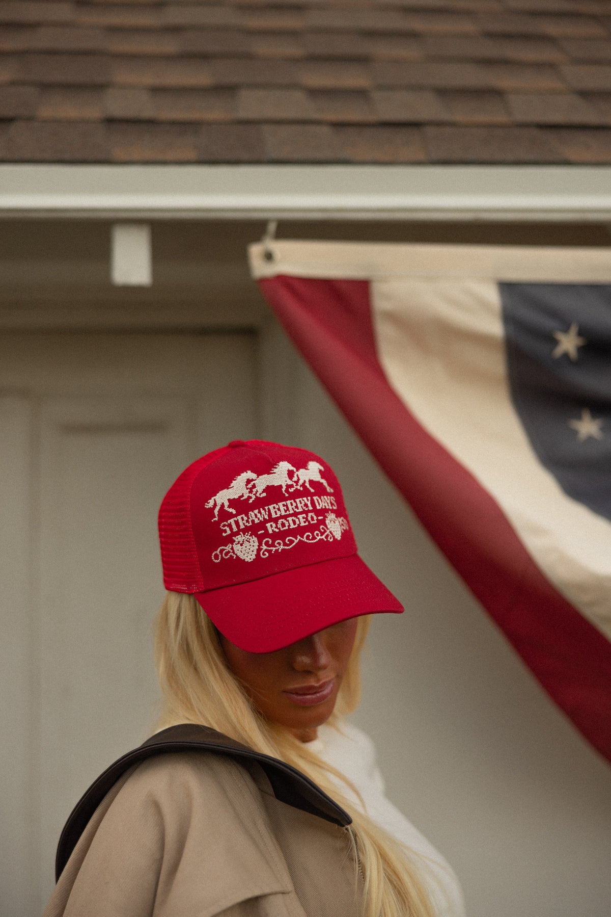 Red Strawberry Days Rodeo trucker hat